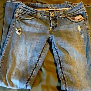Low rise jeans distressed size 9